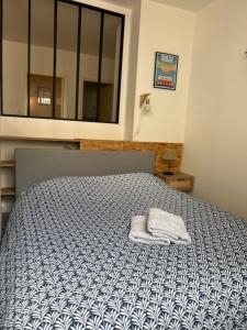 Appartements Les Carmelites : central a 5 min a pied de la Gare : photos des chambres