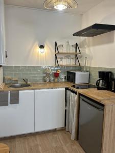Appartements Les Carmelites : central a 5 min a pied de la Gare : photos des chambres