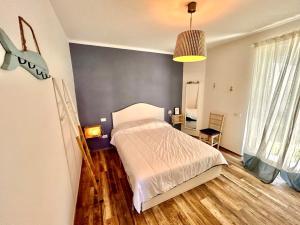 Malù apartment, wifi, private parking and garden in centre