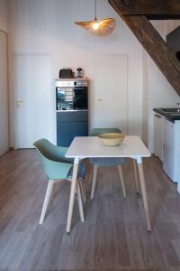 Appartements Suite Kella 2 - Tassin - Beau studio renove : photos des chambres