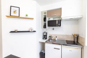 Appartements *Le Gicquel* T1 proche centre : photos des chambres