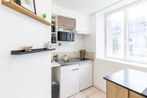 Appartements *Le Gicquel* T1 proche centre : photos des chambres