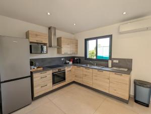 Appartements Maison TESLA aeroport gare cnpe rte Golf de Lyon : photos des chambres