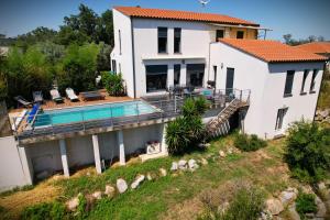Villas Villa contemporaine, jardin mediterraneen et piscine privee : photos des chambres