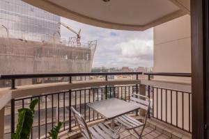 Flat particular com cozinha completa! Serviços de Hotel.