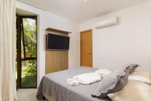 Bangalô pé-na-areia com serviço incluído no Eco Resort Carneiros