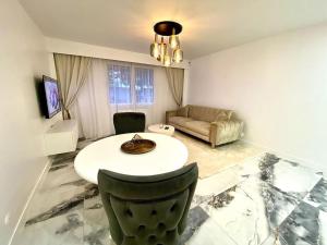 Appartements Appartement chic, quartier calme : photos des chambres