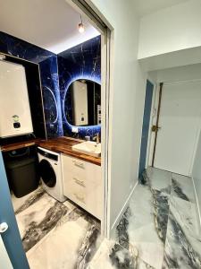 Appartements Appartement chic, quartier calme : photos des chambres