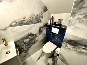Appartements Appartement chic, quartier calme : photos des chambres