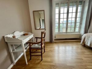 Appartements La Place du Chateau - Vue exceptionnelle sur le chateau de Blois : photos des chambres