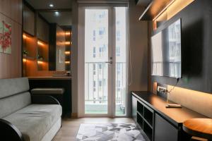 Cozy and Strategic Studio at Tokyo Riverside PIK 2 Apartment By Travelio