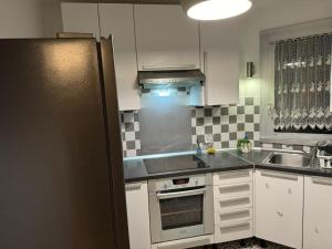 Appartements Superbe appartement, 1er etage avec ascenseur, a 5 min du metro avec parking gratuit : photos des chambres