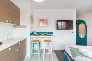 Appartements Heleade by Kleidos - Studio entre Disney, Paris et Aeroport Charles de Gaulle - Parking souterrain gratuit : photos des chambres