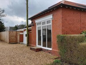 Stunning Coach House with two bedrooms and parking