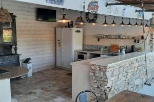Villas Villa avec piscine et cuisine d-ete : photos des chambres
