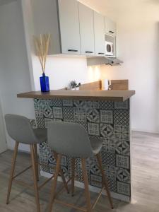 Studio 61, vue mer, wifi, parking privé