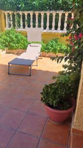 Adosadocasa con terraza y buhardilla. Playa El Perelló