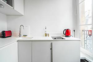 Appartements Louvre Innocent Apartment : photos des chambres