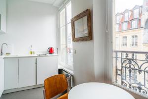 Appartements Louvre Innocent Apartment : photos des chambres