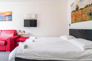 Appartements Louvre Innocent Apartment : photos des chambres