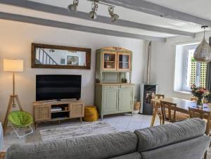 Maisons de vacances Jolie maison avec Jacuzzi : photos des chambres