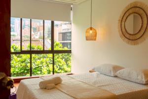 Elegante habitación baño compartido en Poblado-B11