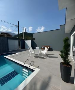 Casa condomínio frente a praia, sinuca, wi-fi, area kids