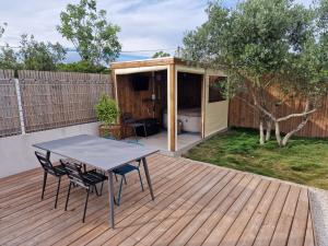 Appartements Au Douni - Jacuzzi, jardin, parking couvert et bureau equipe : photos des chambres