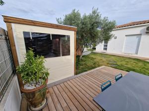 Appartements Au Douni - Jacuzzi, jardin, parking couvert et bureau equipe : photos des chambres