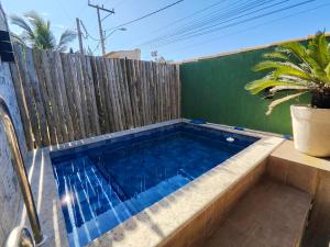 Casa Bougainville - Casa de 3 quartos, frente pro mar, piscina privativa aquecida, Wifi 400 Mb, Playstation 5