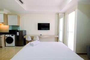 Simply Modern Studio Menteng Park Apartment By Travelio