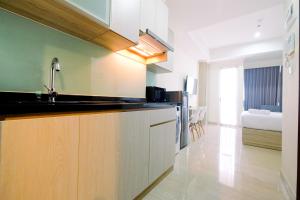 Simply Modern Studio Menteng Park Apartment By Travelio