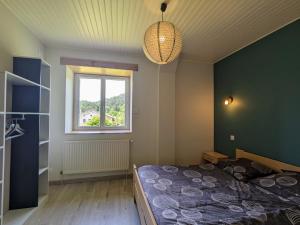 Maisons de vacances Gite authentique et confortable avec vaste terrain et vue imprenable a Saint-Privat-d-Allier - FR-1-582-478 : photos des chambres