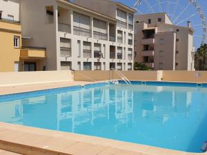 Appartement Climatisé au Centre Port avec Piscine, Parking, et Proche Animations - FR-1-801-8