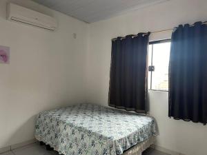 casa 2 quartos bem localizada