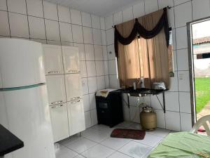 casa 2 quartos bem localizada