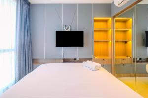 Fabulous 1BR Apartment at The Newton Ciputra World 2 By Travelio