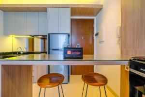 Fabulous 1BR Apartment at The Newton Ciputra World 2 By Travelio