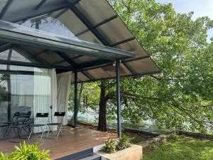 A Glass Haven on the tranquil Munroe Islands - Kottārakara