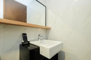 Great Location Studio at The Newton Ciputra World 2 Apartment By Travelio