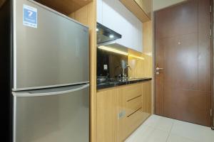 Great Location Studio at The Newton Ciputra World 2 Apartment By Travelio