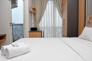 Cozy Living Studio at Menteng Park Apartment By Travelio