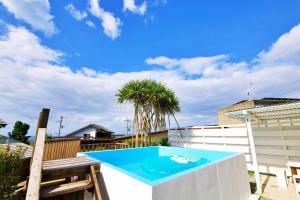 崎本部戸建プール付き g棟 - Ubytování bez kategorie ve městě Motobu