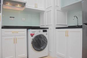 Modern and Comfy 2BR at Menteng Park Apartment By Travelio