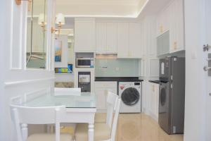 Modern and Comfy 2BR at Menteng Park Apartment By Travelio