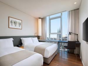 Phòng Tiêu Chuẩn Gia Đình Hai Giường Đơn (Standard Family Twin Room)