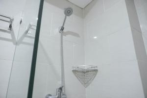 Nice and New 1BR with Office Room at Daan Mogot City Apartment By Travelio
