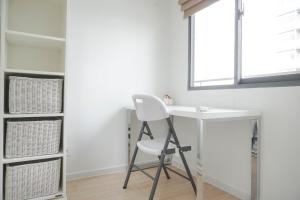 Nice and New 1BR with Office Room at Daan Mogot City Apartment By Travelio