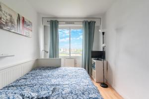 Appartements Le Ptit Henri - Studio a 20min de Paris : photos des chambres