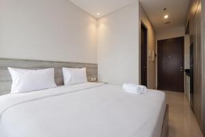 Stunning Studio at Ciputra World 2 Apartment By Travelio